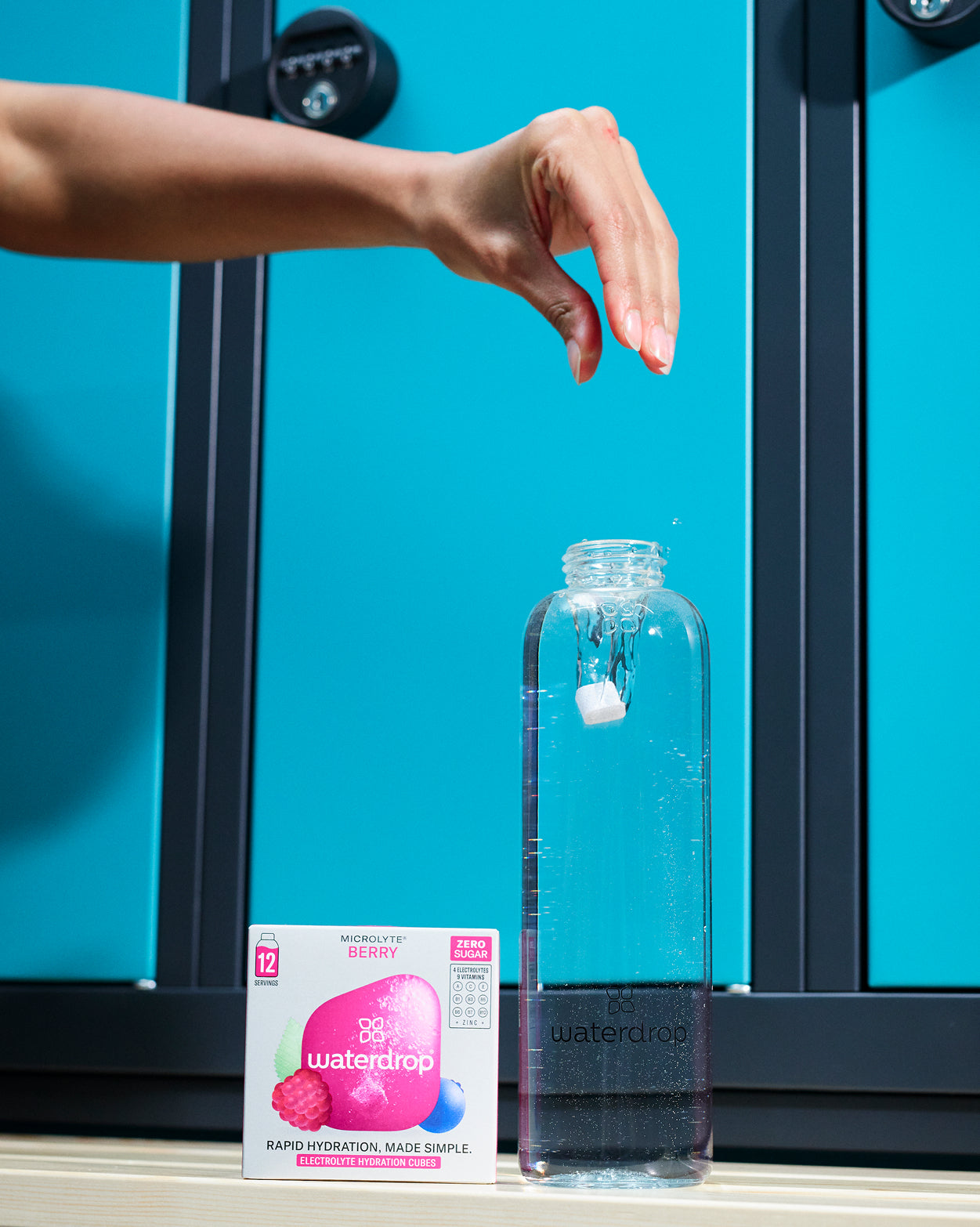 Turbo Workout Hydration Set with Microlyte Berry cube in water bottle.